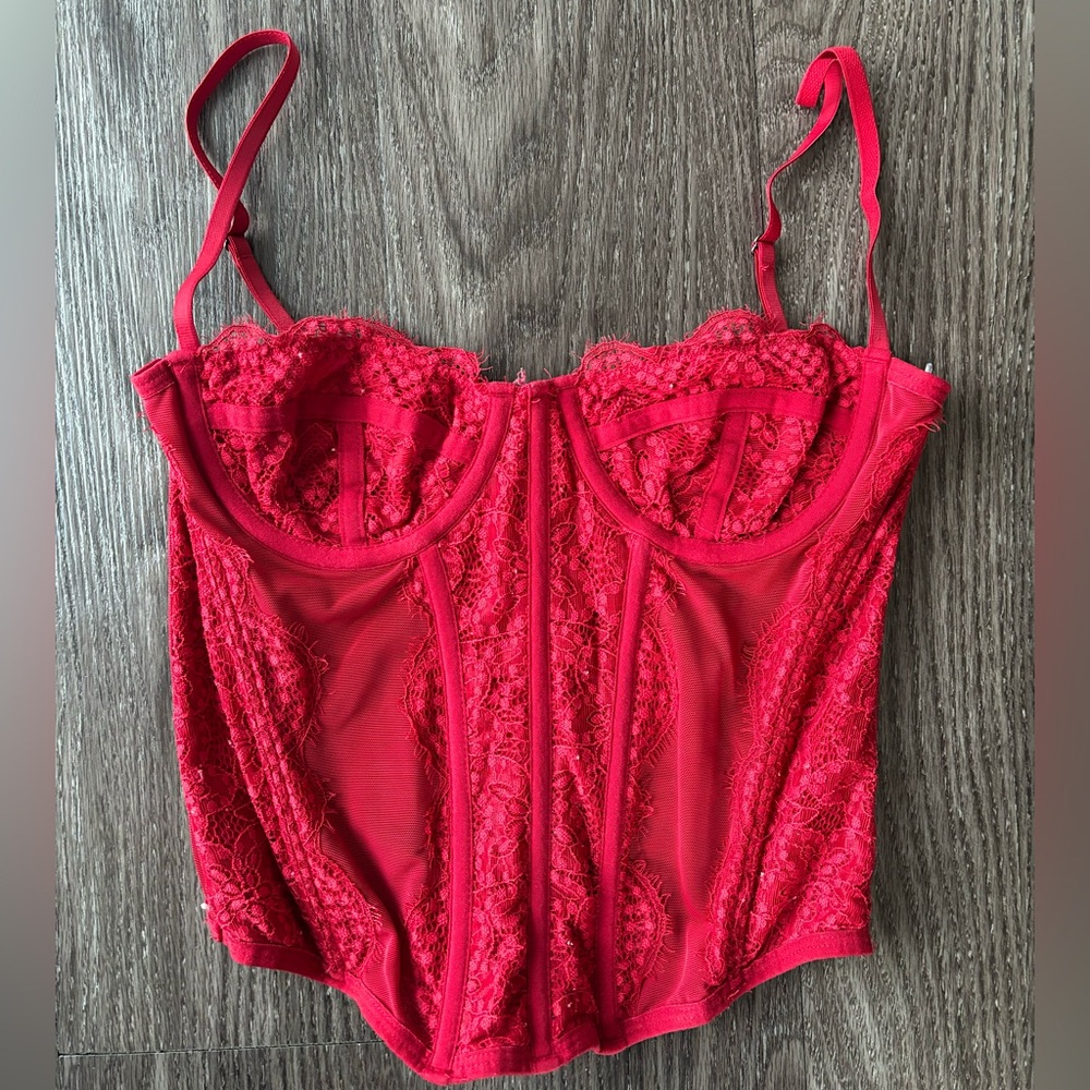 Urban Outfitters Corset in red. Size M